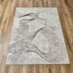 Soft, modern beige-brown rug