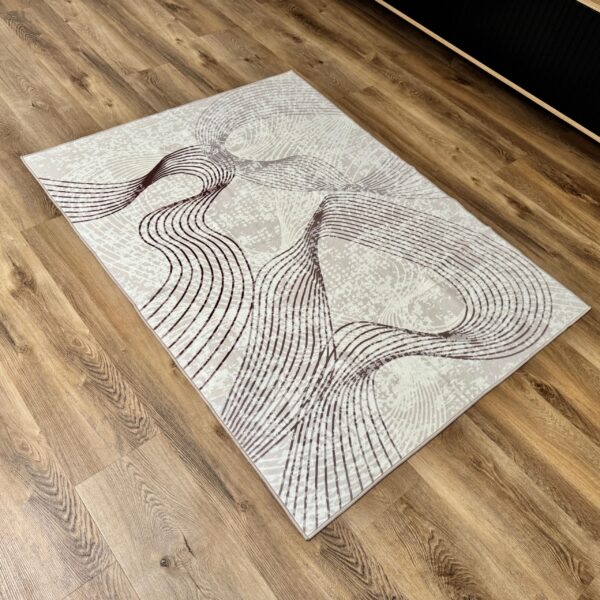 Soft, modern beige-brown rug