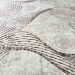 Soft, modern beige-brown rug